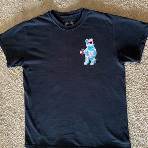 Riot Society Black T with Tropical Palms Bear w Flamingo and Palm tree pattern